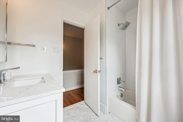 full bathroom featuring shower / bath combo and vanity