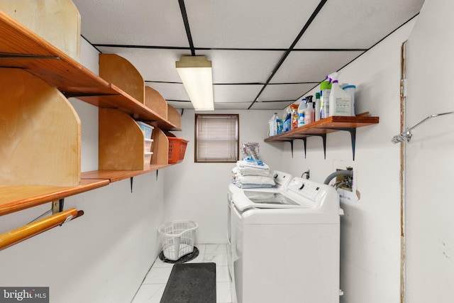 laundry room with washer and dryer and laundry area