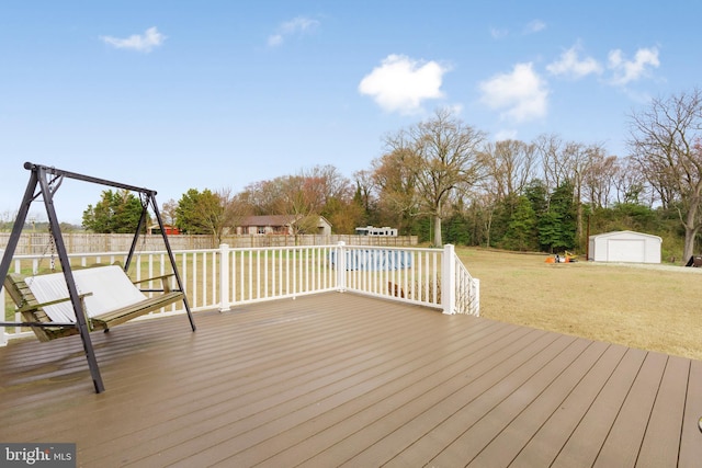 4270 Beulah Rd, Hurlock, MD 21643 - deck with a fenced backyard, an outbuilding, a yard, and a detached garage