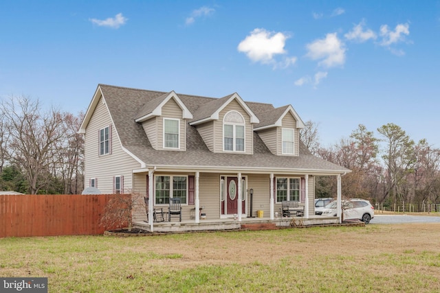 4270 Beulah Rd, Hurlock, MD 21643 - cape cod home featuring a front lawn, covered porch, fence, and roof with shingles