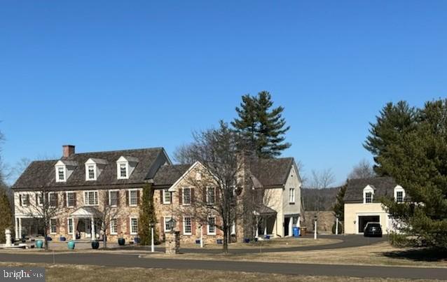 view of front of property with a chimney