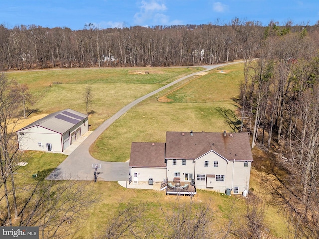 birds eye view of property with a rural view