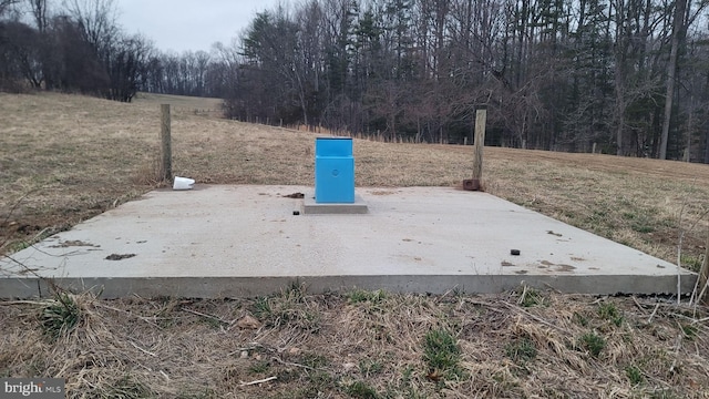view of storm shelter with a lawn