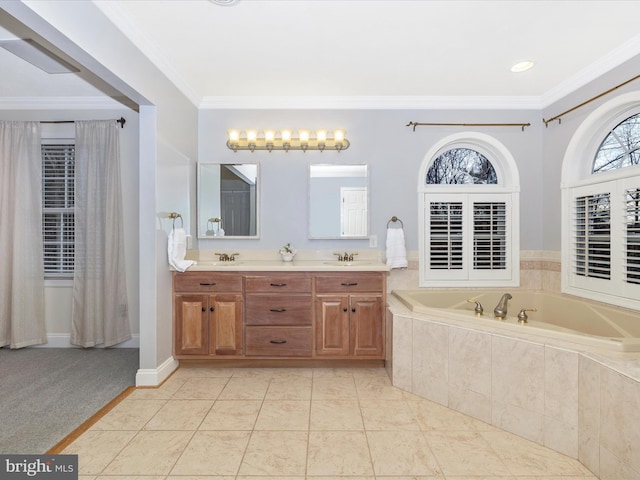 full bathroom featuring crown molding, a sink, and a bath