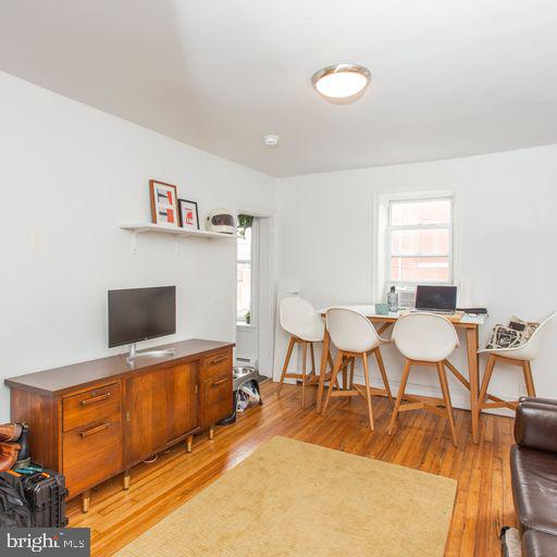 home office with light wood-style floors