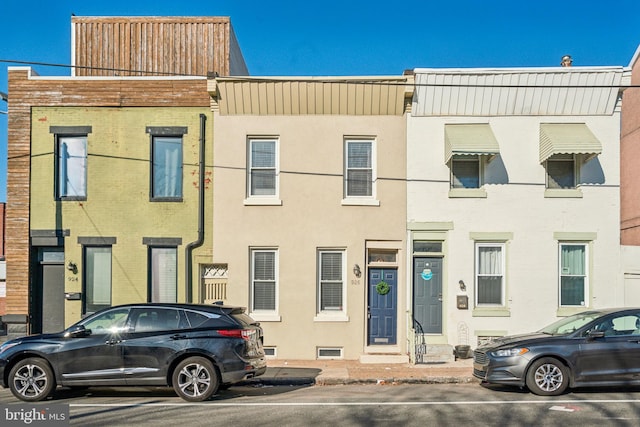 view of property with stucco siding