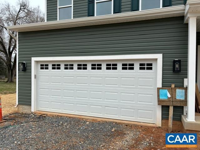 garage featuring driveway