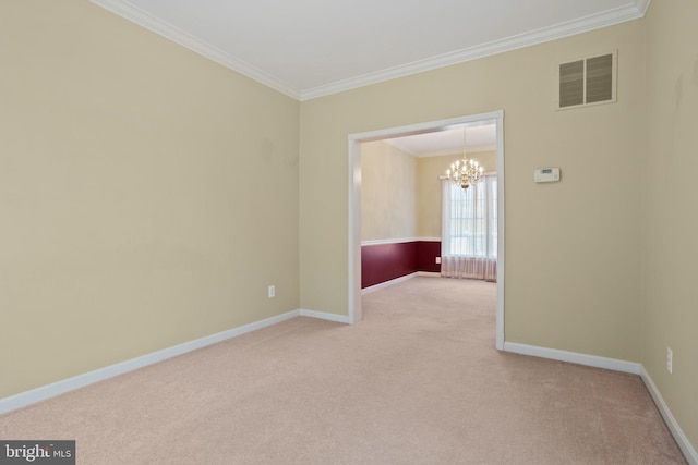 empty room featuring baseboards, visible vents, an inviting chandelier, ornamental molding, and light colored carpet