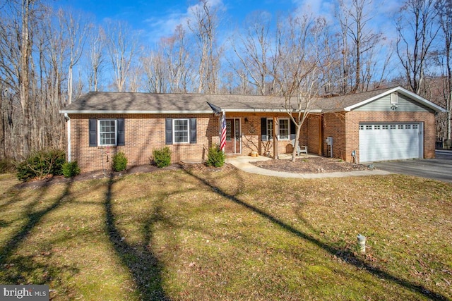 ranch-style house with a front yard, driveway, a porch, a garage, and brick siding