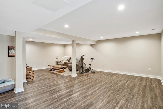 workout area featuring visible vents, recessed lighting, baseboards, and wood finished floors