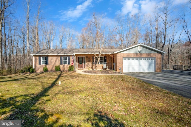 ranch-style home featuring brick siding, an attached garage, a front lawn, a porch, and driveway