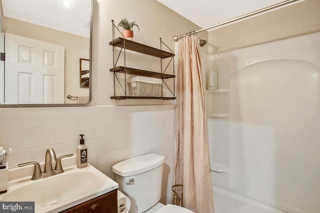 full bath with a shower with shower curtain, toilet, tile walls, and vanity