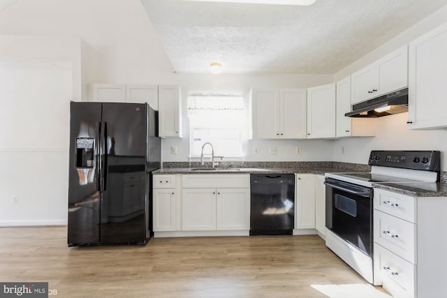 kitchen with a sink, a textured ceiling, white cabinetry, under cabinet range hood, and black appliances