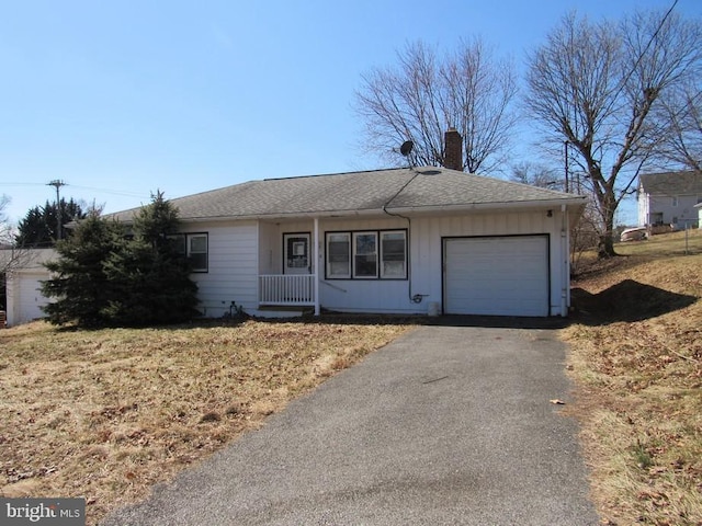 ranch-style house featuring driveway, a shingled roof, a chimney, a garage, and board and batten siding