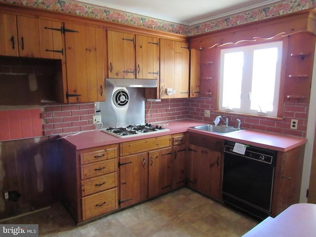 kitchen featuring white gas cooktop, dishwasher, brown cabinets, and light countertops