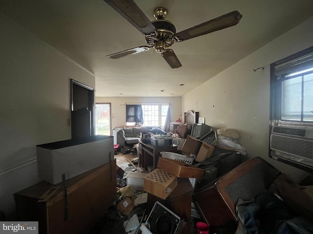 living room with a ceiling fan