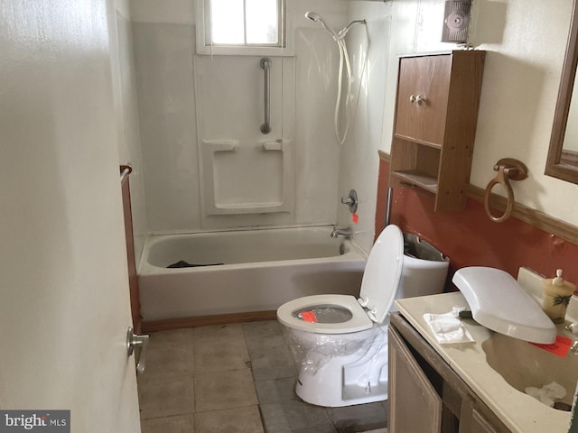 full bathroom featuring tile patterned floors, vanity, toilet, and shower / bath combination