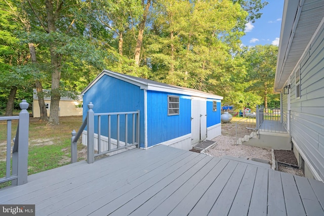 deck featuring an outbuilding