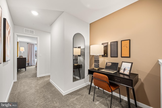 office featuring visible vents, baseboards, and carpet flooring