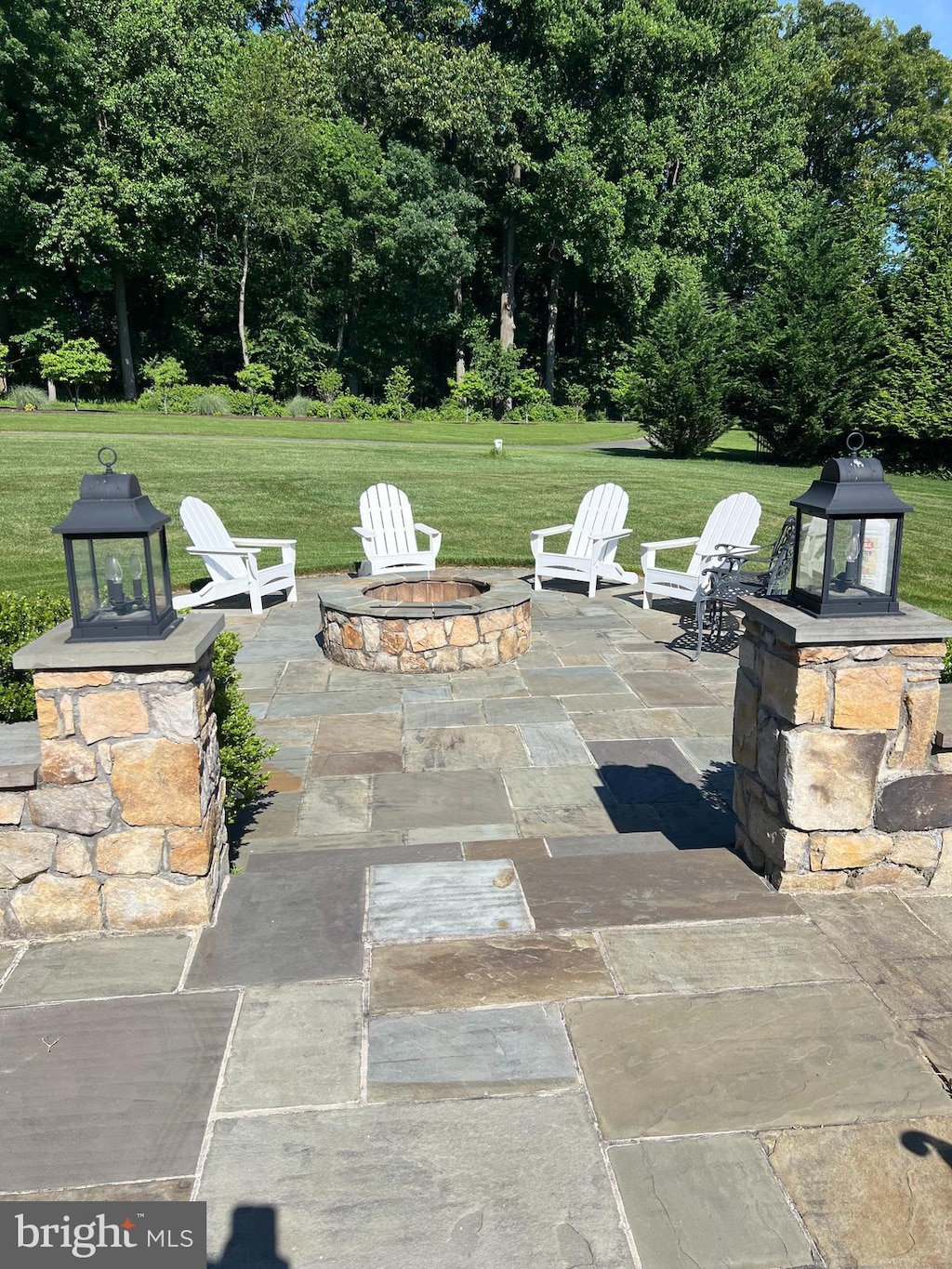 view of patio / terrace featuring a fire pit