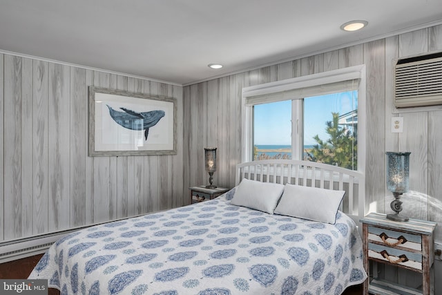 bedroom featuring an AC wall unit