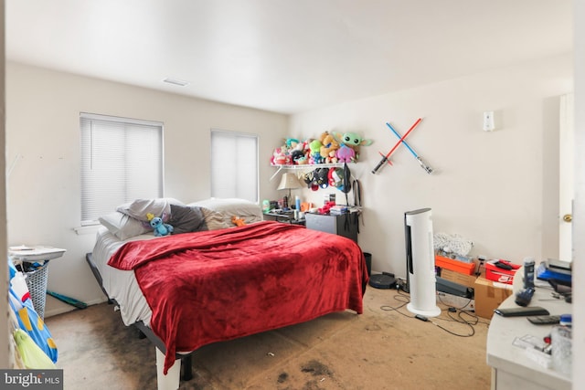 bedroom featuring visible vents