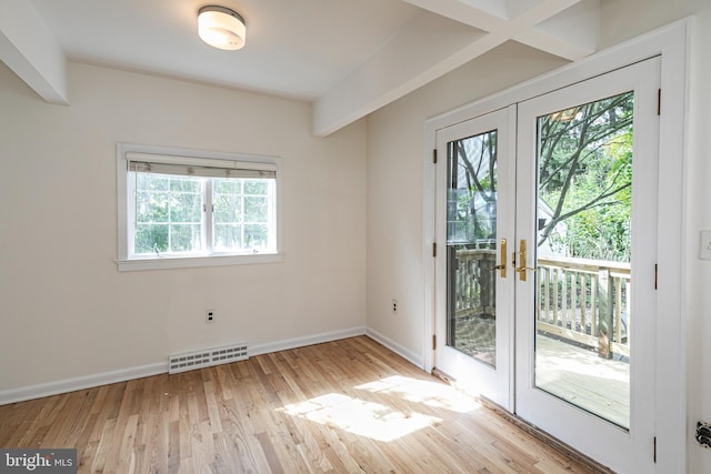 doorway to outside with light wood-style floors, french doors, visible vents, and baseboards