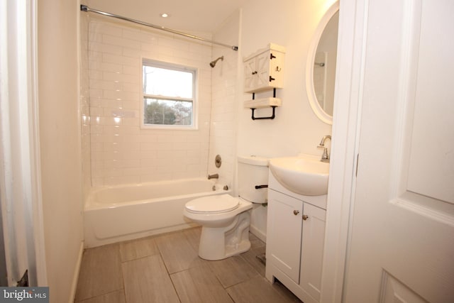 full bathroom with tub / shower combination, toilet, and vanity