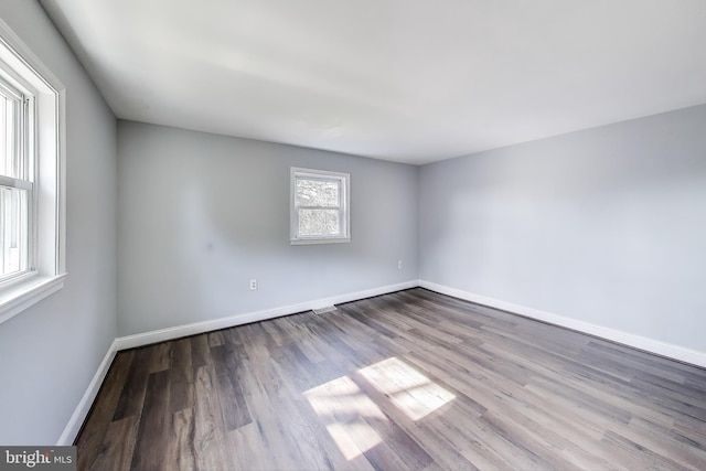 2011 Wardman Rd, Hyattsville, MD 20782 - unfurnished room featuring baseboards and wood finished floors