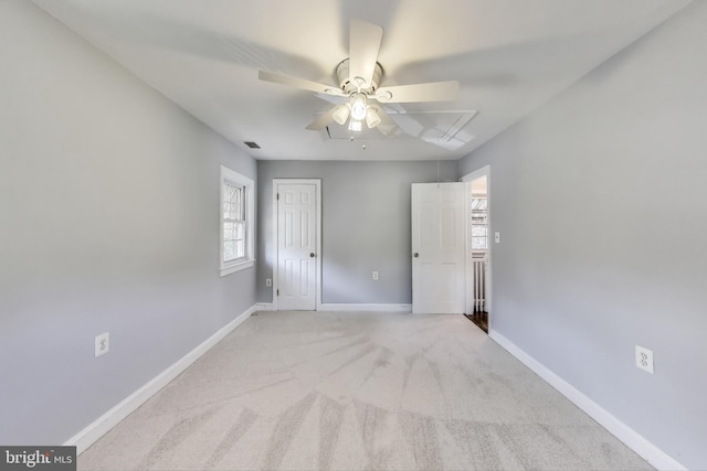 2011 Wardman Rd, Hyattsville, MD 20782 - unfurnished bedroom featuring visible vents, light carpet, a closet, baseboards, and attic access