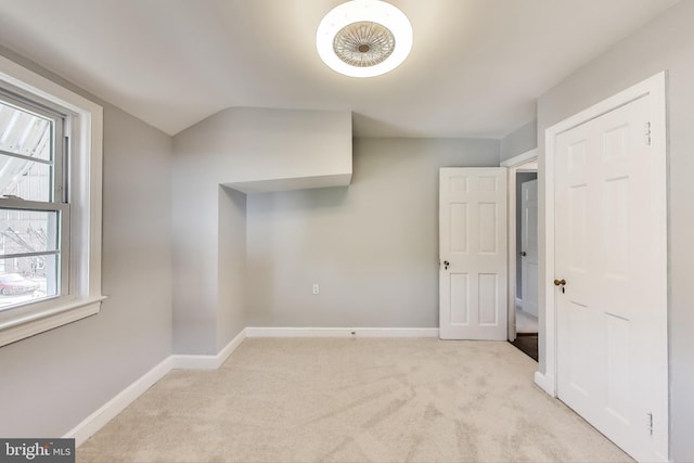2011 Wardman Rd, Hyattsville, MD 20782 - interior space featuring lofted ceiling, baseboards, and carpet floors