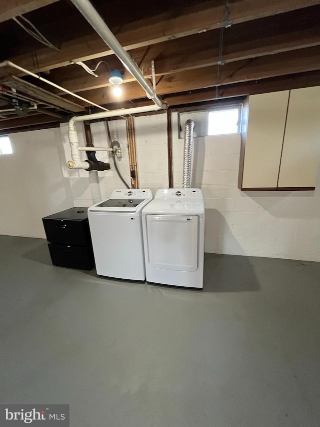 below grade area with washing machine and dryer