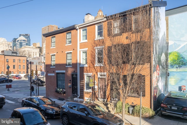 view of building exterior with a city view