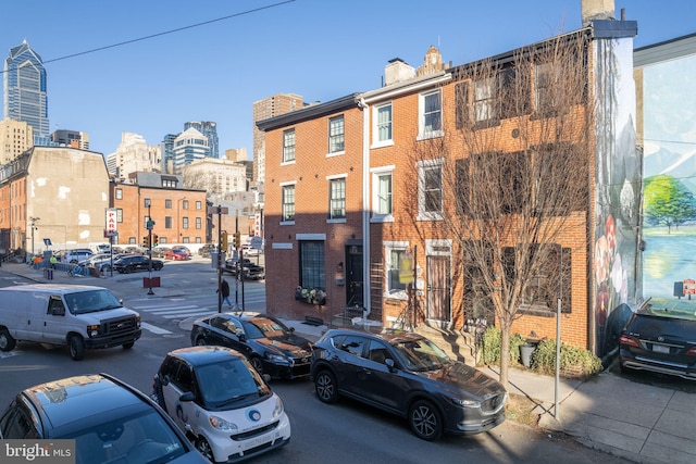 view of building exterior featuring a city view