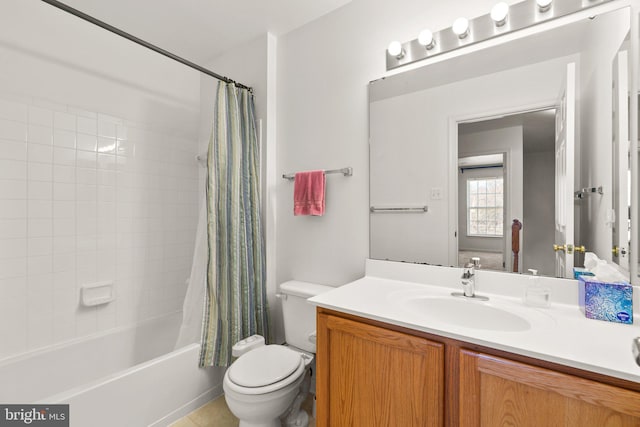 full bathroom with toilet, shower / tub combo with curtain, and vanity