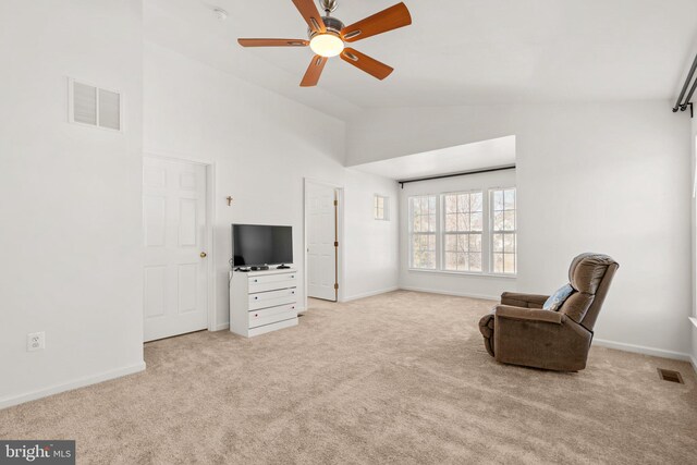 unfurnished room with baseboards, visible vents, carpet floors, and ceiling fan