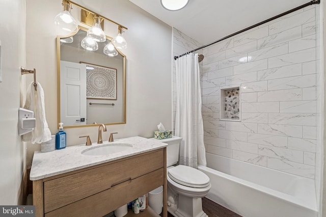 full bath featuring toilet, vanity, and shower / bath combo