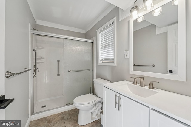 full bathroom with vanity, a stall shower, tile patterned flooring, crown molding, and toilet