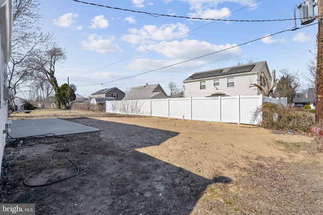 view of yard featuring a patio area and fence