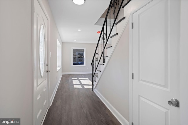 foyer entrance with recessed lighting, stairway, baseboards, and dark wood-style flooring