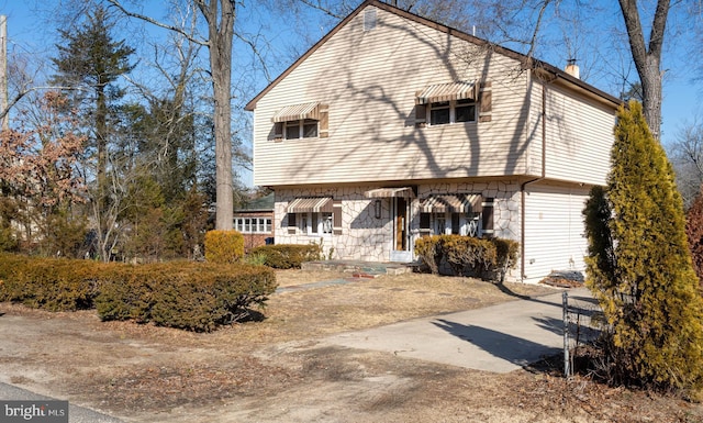 back of property featuring a chimney