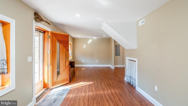 interior space with recessed lighting, visible vents, baseboards, and wood finished floors