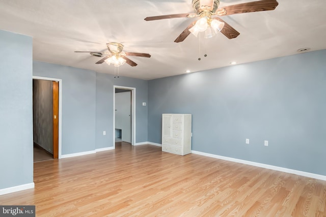 spare room with light wood-style flooring, recessed lighting, baseboards, and ceiling fan