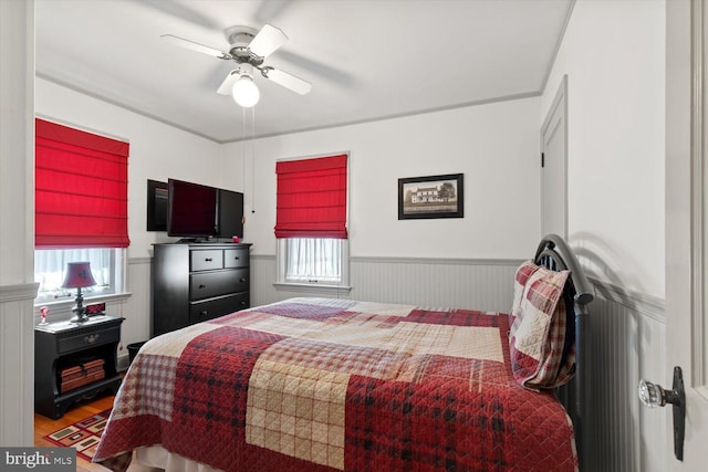 802 E 11th Ave, York, PA 17402 - bedroom featuring wainscoting, ceiling fan, and wood finished floors