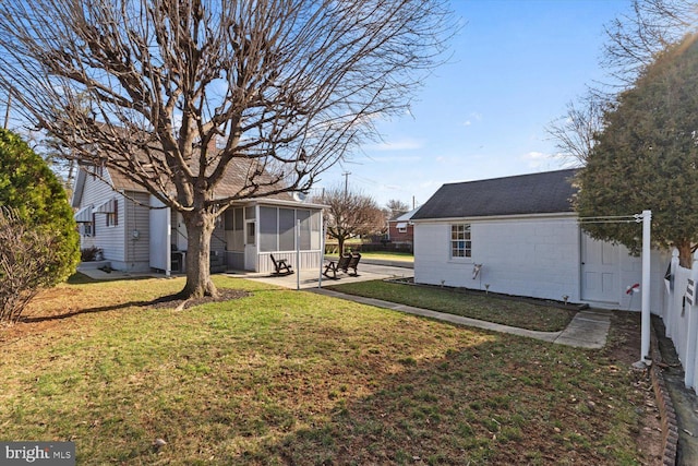 802 E 11th Ave, York, PA 17402 - view of yard with fence, a patio, and a sunroom