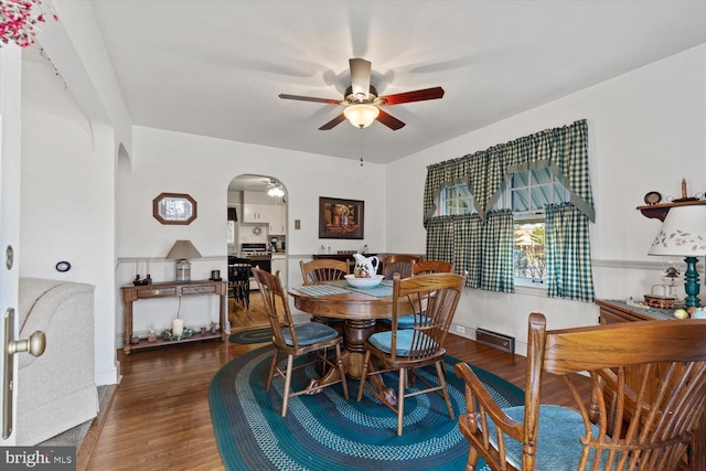 802 E 11th Ave, York, PA 17402 - dining space with arched walkways, ceiling fan, and wood finished floors