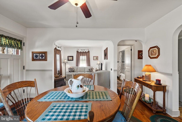 802 E 11th Ave, York, PA 17402 - dining area featuring arched walkways, wood finished floors, and a ceiling fan