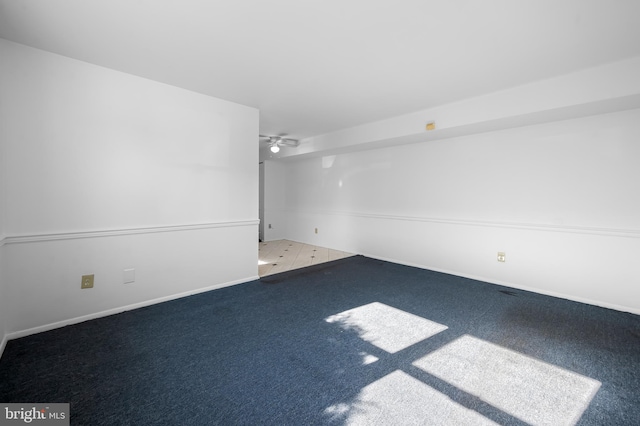 spare room featuring carpet floors