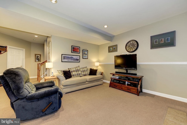 carpeted living room with recessed lighting and baseboards