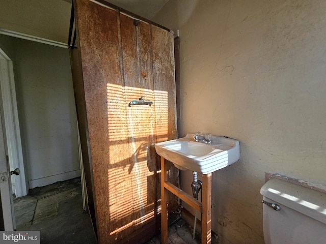 miscellaneous room with a sink